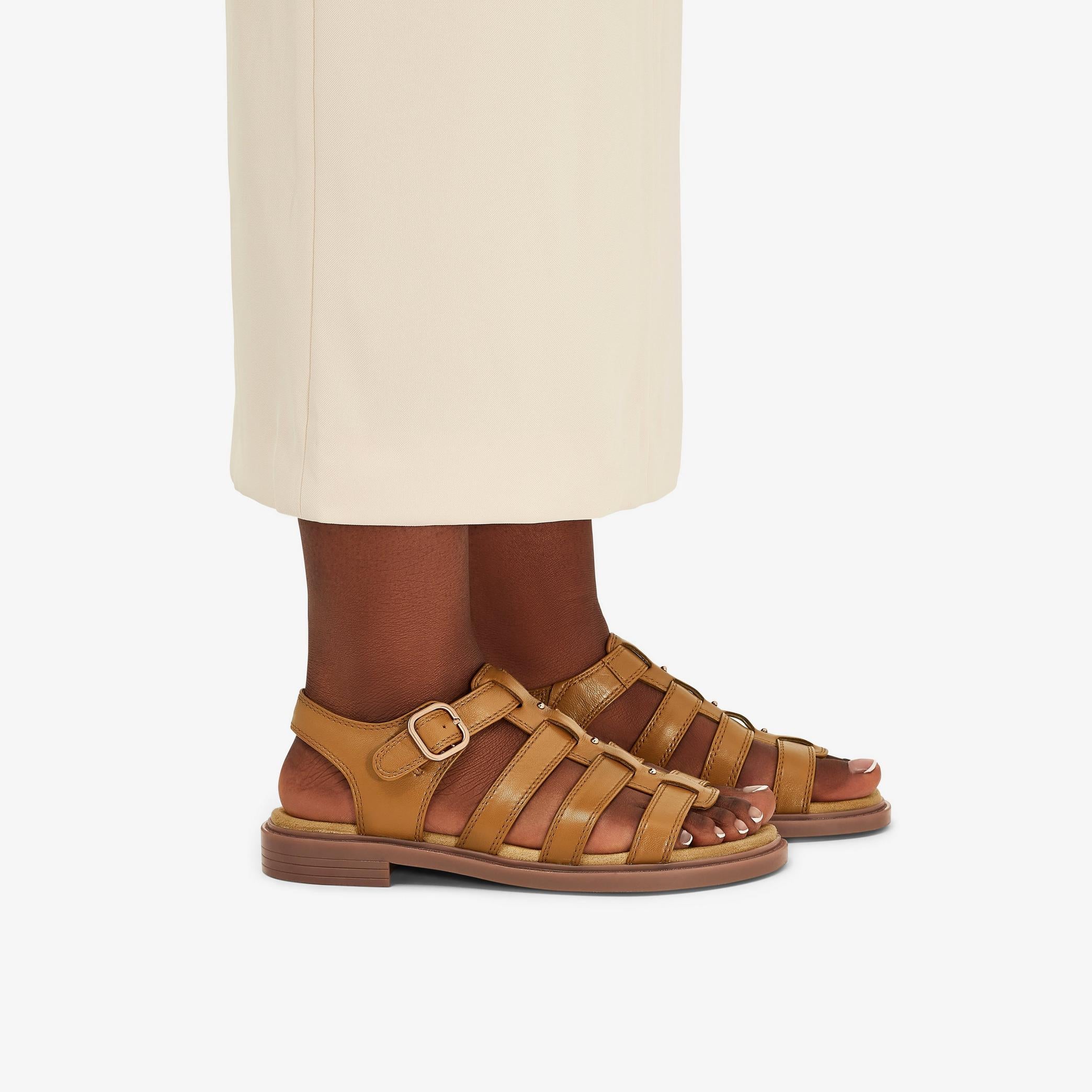 Trivanni Lux
Cuir brun