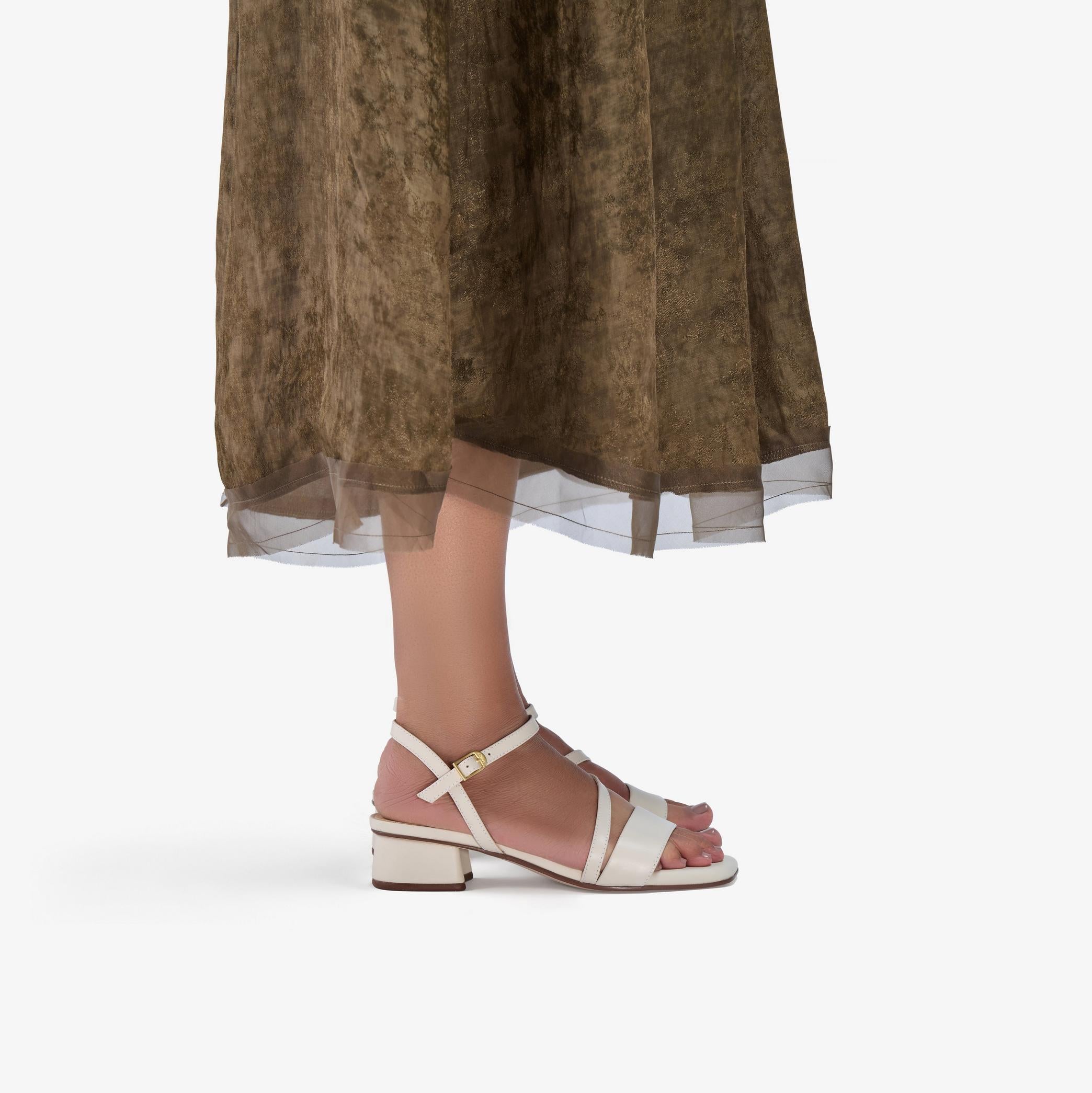 Serina35 Strap
Cuir beige cr��me