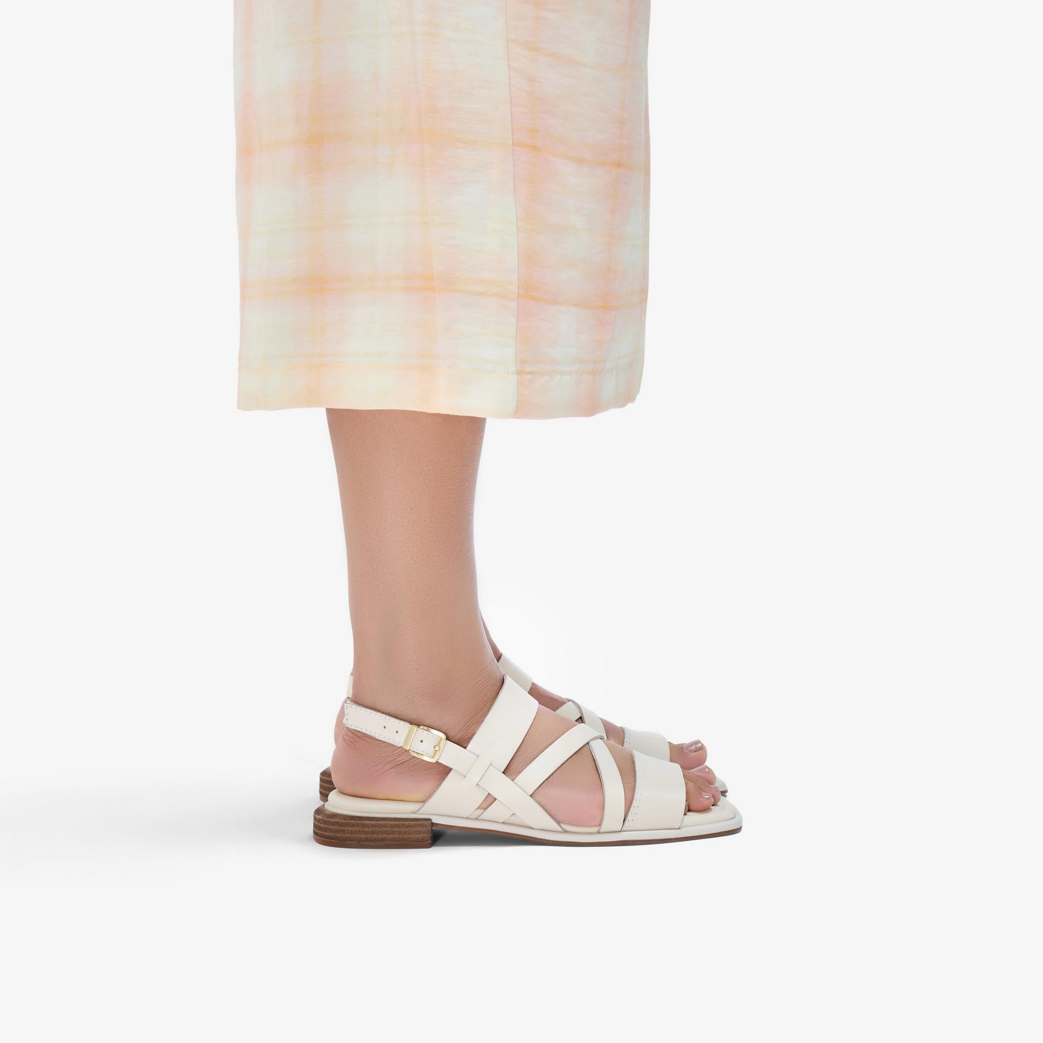 Ariany Strap
Cuir beige cr��me