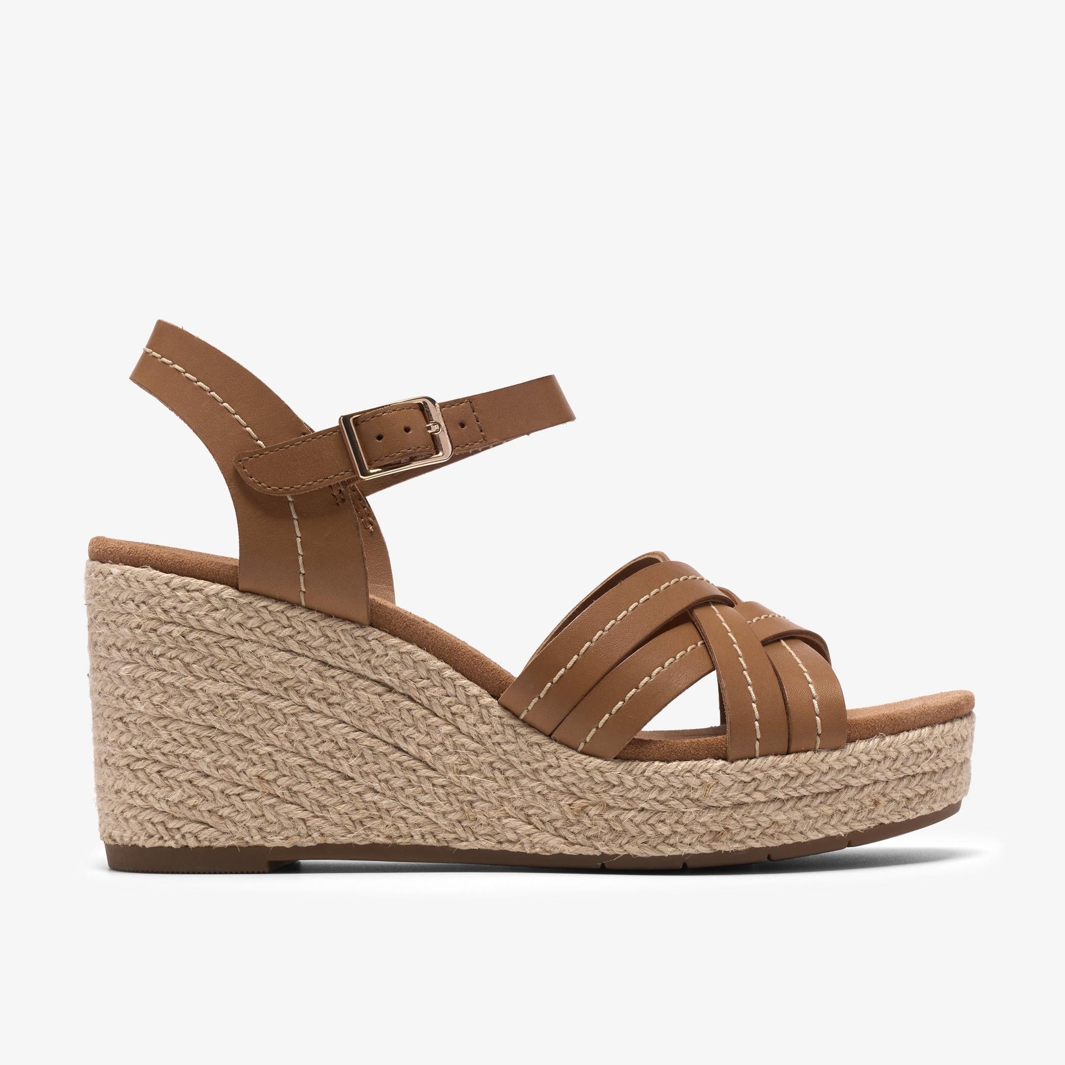Sabina Strap
Cuir brun