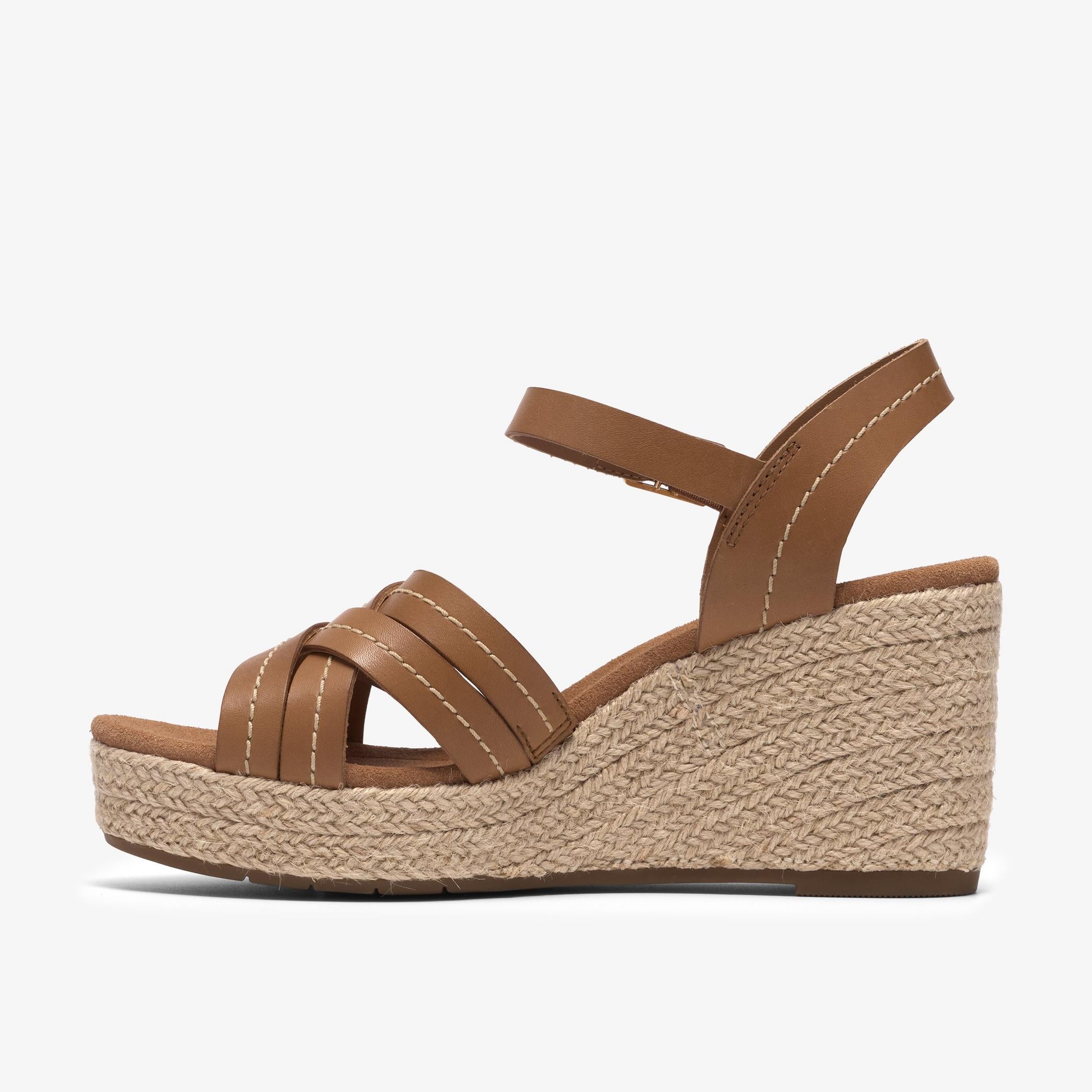 Sabina Strap
Cuir brun
