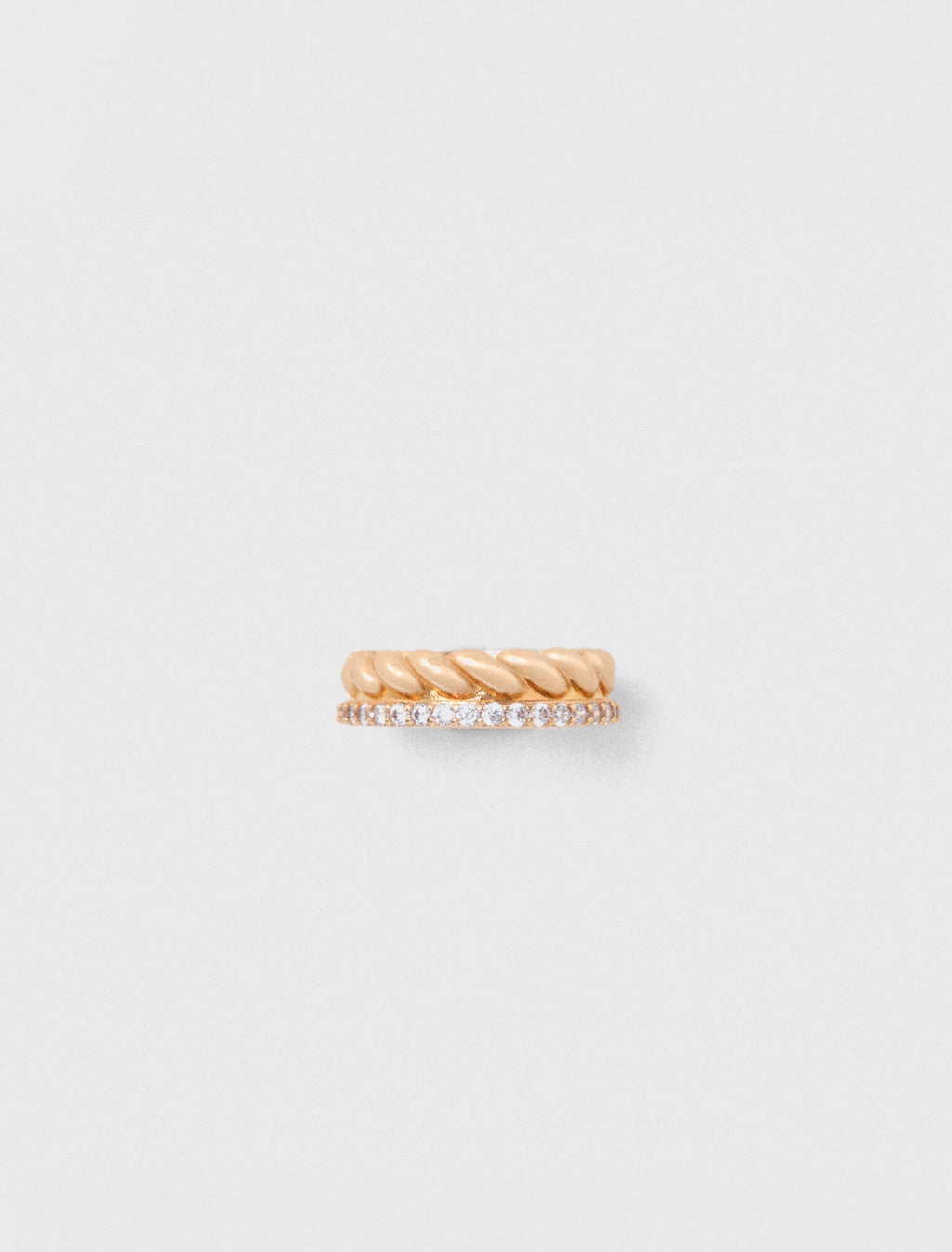 Bague dorée torsadée et strassée