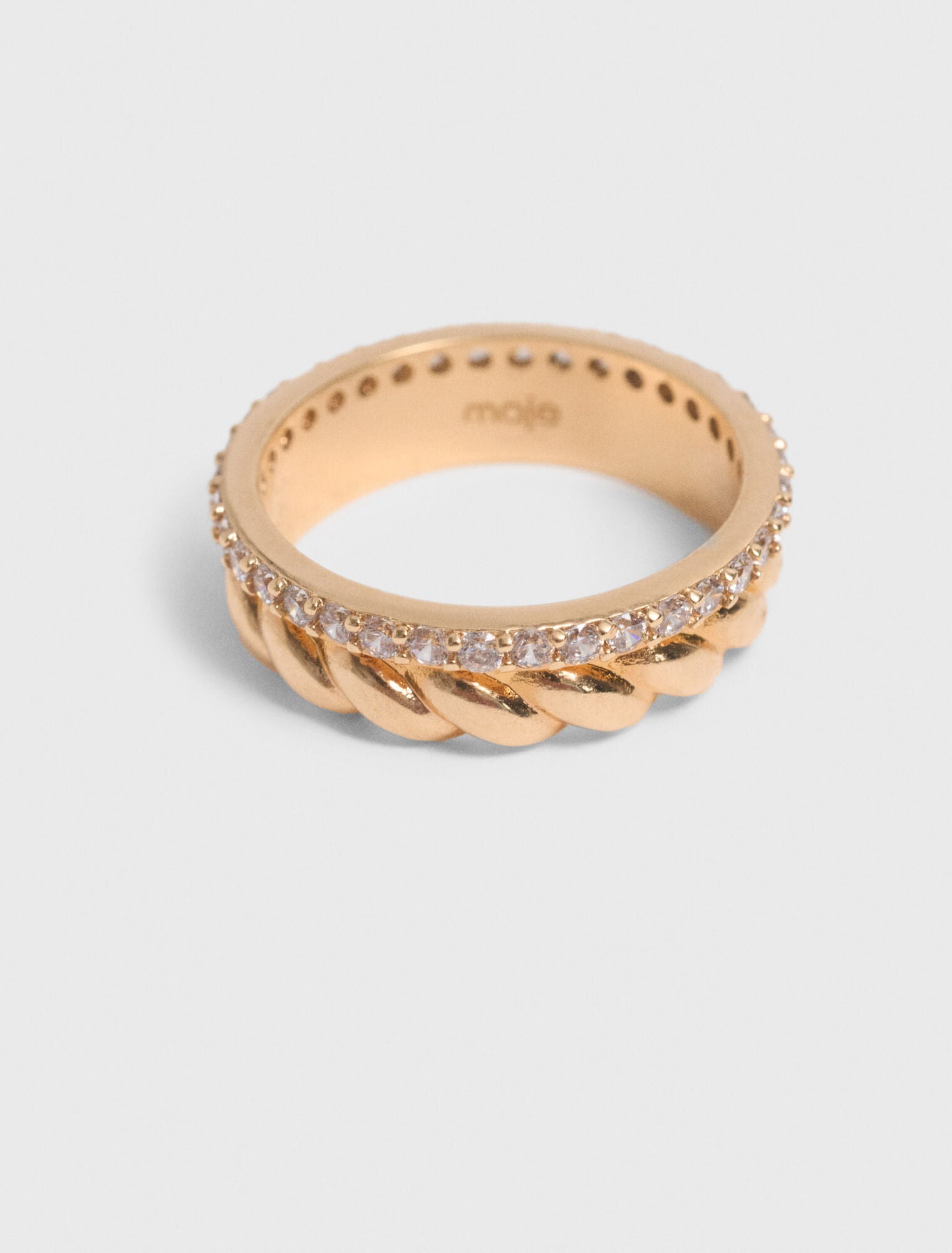 Bague dorée torsadée et strassée