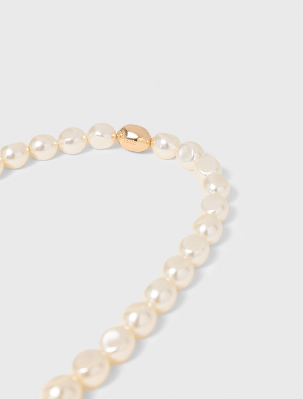 Collier choker en perles